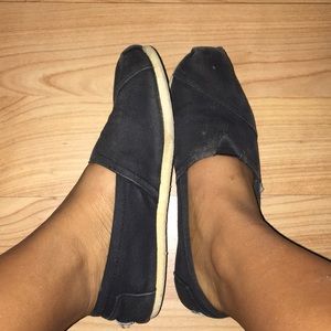Black slip on Toms